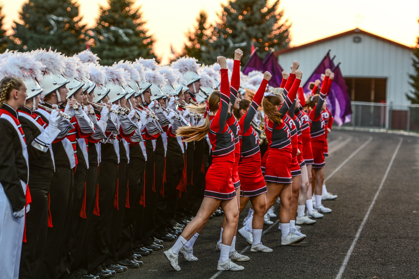 Forest City Cheerleaders and Marching Band welcome their team onto the field.jpg